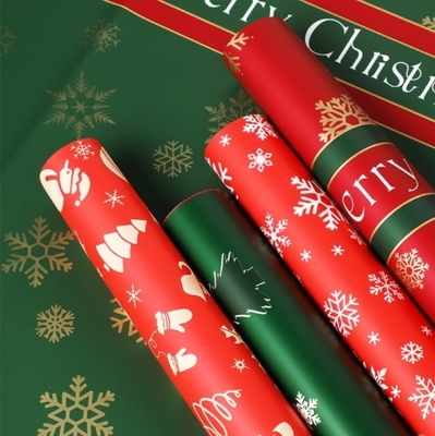 良い価格 クリスマスの花の包装紙 クリスマスイブのリンゴの花束の包装紙 防水雪花セルロファン オウヤ紙のプレゼント オンライン