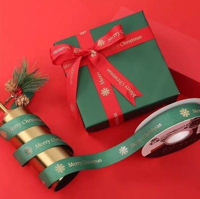 良い価格 印刷されたポリエステル サテンのGrosgrainのリボン25mmの赤いクリスマスのリボン オンライン