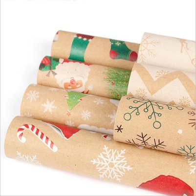 良い価格 80gsmクリスマス様式のギフト用包装紙のペーパーは50cm*70cmを多くの新しい設計広げる オンライン